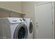 Modern laundry room equipped with a Samsung washer and dryer, and featuring ample storage for efficient chores at 3522 W Rushmore Dr, Anthem, AZ 85086