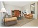 Comfortable living room featuring a custom built-in entertainment center and plush seating at 3522 W Rushmore Dr, Anthem, AZ 85086