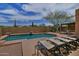 Inviting backyard pool with lounge chairs and a pergola to enjoy the beautiful weather at 3522 W Rushmore Dr, Anthem, AZ 85086