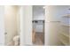 Bathroom with toilet and access to walk in closet at 36467 W Pampoloma Ave, Maricopa, AZ 85138