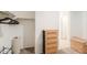Walk-in closet with dresser, shelves and carpeted floor at 36467 W Pampoloma Ave, Maricopa, AZ 85138
