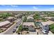 Birds eye view of a desert community featuring single-Gathering homes with tiled roofs and mature landscaping on spacious lots at 3786 S Chaparral Rd, Apache Junction, AZ 85119