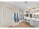 Neutral-toned bathroom with a vanity, sink, shower, and tub at 3786 S Chaparral Rd, Apache Junction, AZ 85119