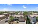 Inviting two-story home with a well-manicured lawn, desert landscaping, and a spacious driveway in a quiet neighborhood at 3786 S Chaparral Rd, Apache Junction, AZ 85119