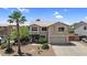 Charming two-story home featuring a well-manicured lawn, mature trees, and inviting curb appeal in a desirable neighborhood at 3786 S Chaparral Rd, Apache Junction, AZ 85119