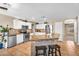 Kitchen with white cabinetry, stainless appliances, and eat-in bar at 3786 S Chaparral Rd, Apache Junction, AZ 85119