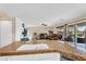 The kitchen features granite countertops, a stainless steel dishwasher, and a sink with views into the living room at 3786 S Chaparral Rd, Apache Junction, AZ 85119