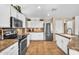 Bright kitchen featuring stainless appliances and ample cabinet space at 3786 S Chaparral Rd, Apache Junction, AZ 85119