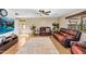 Inviting living room with leather furniture, neutral decor, and an area rug in a well-lit space at 3786 S Chaparral Rd, Apache Junction, AZ 85119