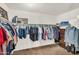 Walk-in closet with hanging racks, shelving, and a built-in dresser for ample storage at 3786 S Chaparral Rd, Apache Junction, AZ 85119