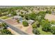 Wide aerial shot capturing this neighborhood's lush, green landscaping and sparkling pools at 3964 S Turquoise Dr, Buckeye, AZ 85326
