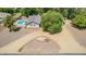 Aerial view of a home showcasing desert landscaping and a backyard pool with lounge area at 3964 S Turquoise Dr, Buckeye, AZ 85326