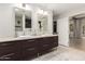 Bathroom featuring double vanity, granite countertop, modern fixtures, and tile flooring at 3964 S Turquoise Dr, Buckeye, AZ 85326
