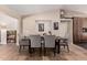 Open-concept dining area features seating for six and plenty of natural light at 3964 S Turquoise Dr, Buckeye, AZ 85326