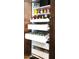 Organized pantry with pull-out shelves and canned goods, spices, and a variety of other pantry staples at 3964 S Turquoise Dr, Buckeye, AZ 85326