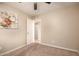 Spacious bedroom with carpet flooring, ceiling fan and natural light at 4145 W Hayward Ave, Phoenix, AZ 85051