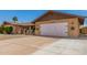 Spacious two car garage with attached living quarters perfect for housing vehicles and/or storage at 4145 W Hayward Ave, Phoenix, AZ 85051