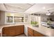 This kitchen features a window above the sink looking out to the backyard and a breakfast nook at 4145 W Hayward Ave, Phoenix, AZ 85051