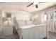 Cozy main bedroom with plush carpeting, a decorative headboard, and a ceiling fan at 4145 W Hayward Ave, Phoenix, AZ 85051