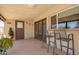 Spacious patio with barstools and lush greenery at 4145 W Hayward Ave, Phoenix, AZ 85051