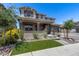 Inviting two-story home with manicured lawn and charming front porch at 41650 W Barcelona Dr, Maricopa, AZ 85138