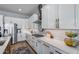 Gourmet kitchen featuring stainless appliances, gas cooktop, and ample counter space at 41650 W Barcelona Dr, Maricopa, AZ 85138
