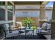 Relaxing covered patio with plush seating, perfect for enjoying the outdoors at 41926 W Sussex Dr, Maricopa, AZ 85138