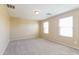 Bedroom with neutral carpet and a natural light-filled atmosphere at 42564 W Palmyra Ln, Maricopa, AZ 85138