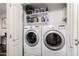 Conveniently located laundry room featuring a side-by-side washer and dryer set at 4343 N 21St St # 158, Phoenix, AZ 85016
