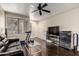 Spacious living room features wood floors and abundant natural light at 4343 N 21St St # 158, Phoenix, AZ 85016