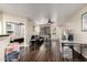 Expansive living room with wood floors offers a glimpse into bedroom at 4343 N 21St St # 158, Phoenix, AZ 85016