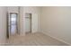 Bedroom with carpet floors and closet at 44092 W Stonecreek Rd, Maricopa, AZ 85139