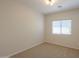 Bright and airy bedroom with a window and carpet floors at 44092 W Stonecreek Rd, Maricopa, AZ 85139