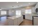 This kitchen features an island and stainless steel appliances at 44092 W Stonecreek Rd, Maricopa, AZ 85139