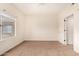 Inviting bedroom with a large window and neutral-toned walls at 4455 E Paradise Village S Pkwy # 1057, Phoenix, AZ 85032