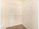 Spacious closet with carpeted floor and white wire shelving for optimal organization and storage at 4455 E Paradise Village S Pkwy # 1057, Phoenix, AZ 85032