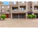 Charming townhome with two-car garage and decorative balcony railings at 4455 E Paradise Village S Pkwy # 1057, Phoenix, AZ 85032