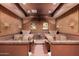 Home theater featuring plush seating and classic movie posters creating a cozy and entertaining space at 4455 E Paradise Village S Pkwy # 1057, Phoenix, AZ 85032