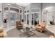 Bright community lobby area with comfortable seating and refined decor, perfect for relaxing with friends at 4455 E Paradise Village S Pkwy # 1057, Phoenix, AZ 85032