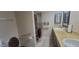 Bathroom with double sinks, granite countertops, decorative mirrors, and walk-in shower at 4733 W Eva St, Glendale, AZ 85302