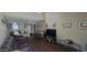 Spacious living room with high ceilings, wood floors, and natural light at 4733 W Eva St, Glendale, AZ 85302