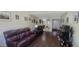 Open concept living room with hard surface flooring, neutral color palette and vaulted ceilings at 4733 W Eva St, Glendale, AZ 85302