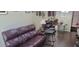 Spacious living room featuring hardwood floors and a sofa at 4733 W Eva St, Glendale, AZ 85302
