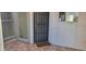 Tile front patio with security door and window at 4733 W Eva St, Glendale, AZ 85302