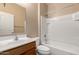 This is a bathroom with a white tub and shower combo, toilet and sink at 47719 N Camino Del Sol --, Gold Canyon, AZ 85118