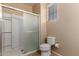 Bathroom featuring a toilet and shower with frosted glass door at 47719 N Camino Del Sol --, Gold Canyon, AZ 85118