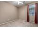 Carpeted bedroom with a large window and stylish curtains at 47719 N Camino Del Sol --, Gold Canyon, AZ 85118
