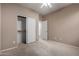 Bedroom with carpet and a closet with mirrored doors at 47719 N Camino Del Sol --, Gold Canyon, AZ 85118