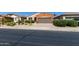 Charming home with desert landscaping, a two-car garage, and classic Southwestern architecture at 47719 N Camino Del Sol --, Gold Canyon, AZ 85118