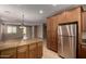 Spacious kitchen featuring granite countertops, stainless steel appliances, and tile flooring at 47719 N Camino Del Sol --, Gold Canyon, AZ 85118